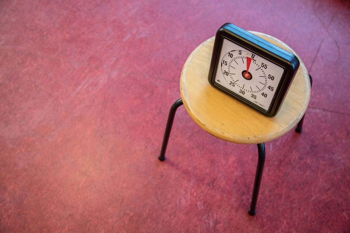 time management game for students showing split-screen interface: left side shows in-game campus map with color-coded class buildings; right side shows real-world digital calendar with synced deadlines